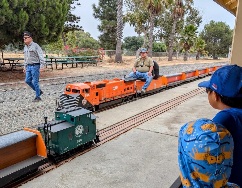 Kids waiting in line to ride the Goathill Junction Railroad miniature train in Costa Mesa